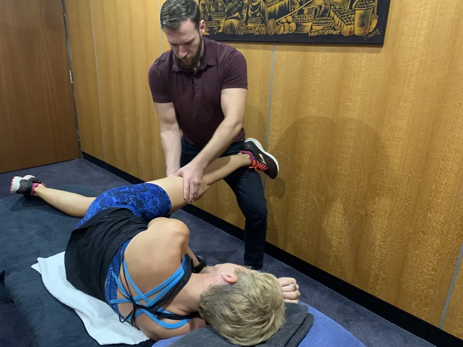 Practitioner treating a client at Active Performance Clinic
